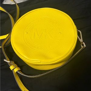 Round yellow Michael kors crossbody